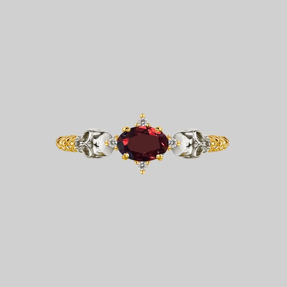 POISON. Garnet & Skulls Ring - Gold