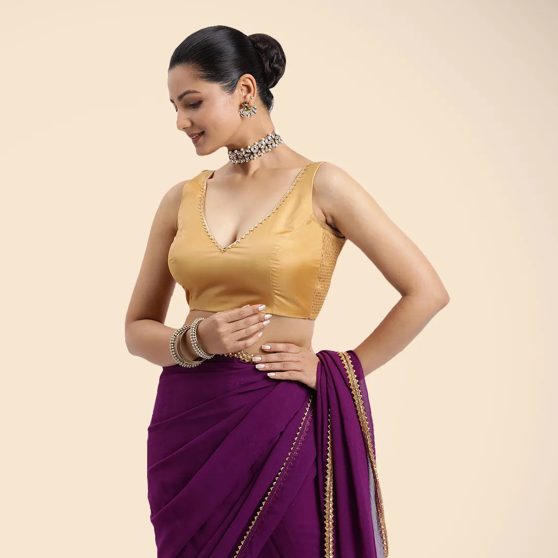 Raisa x Tyohaar | Gold Sleeveless FlexiFit™ Saree Blouse with V Neckline with Golden Gota Lace Embellishment and Back Cut-out with Tie-Up